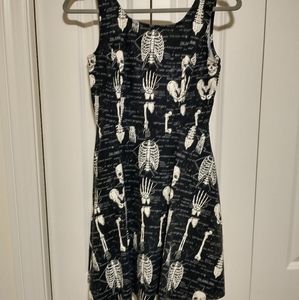 Anatomical black skeleton skater dress with pockets